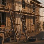 Renovation maison ancienne aide - facade maison en pierre en cours de renovation